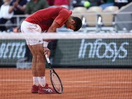 Djokovic's French Open Title Defense in Doubt After Knee Injury