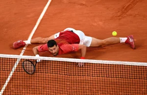 Djokovic's French Open Title Defense in Doubt After Knee Injury